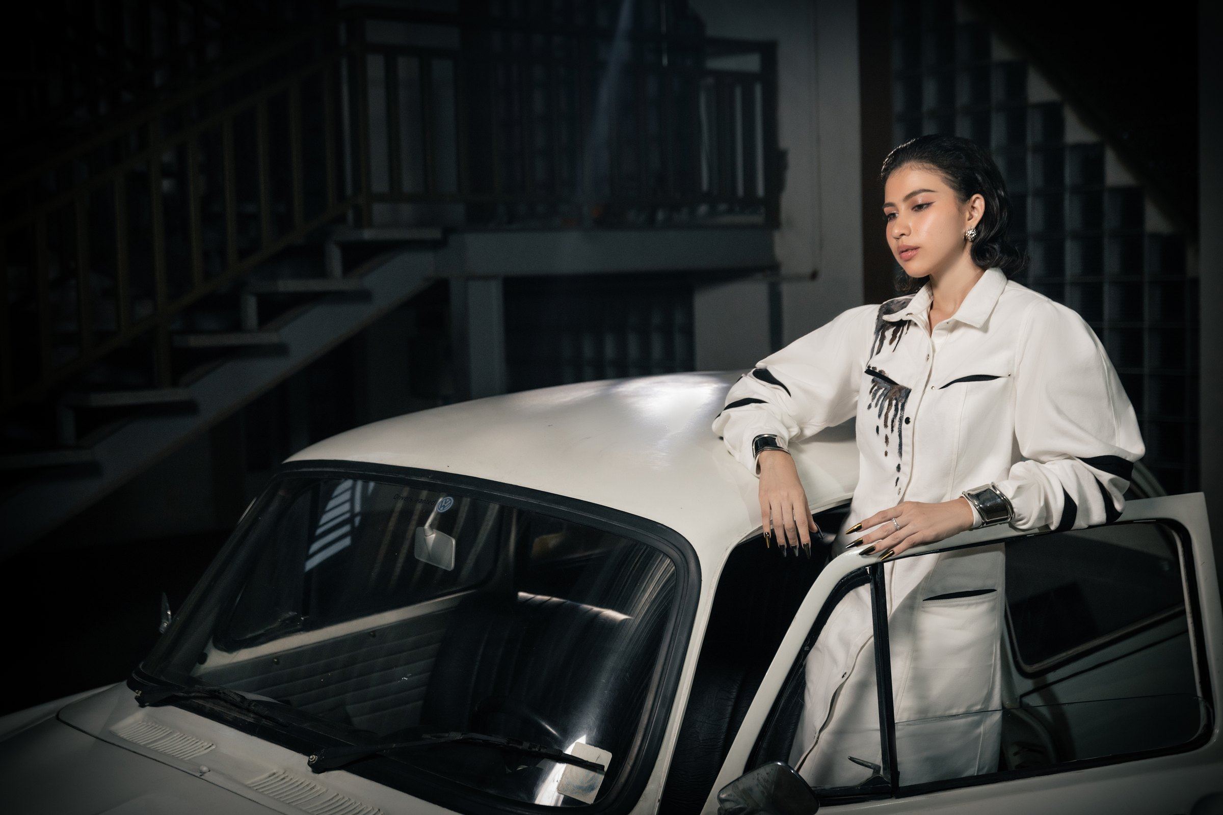 The white denim coat from Myanmar's Essence, worn open